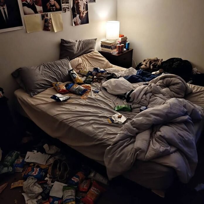 Chaotic bedroom binge setup with chip crumbs everywhere