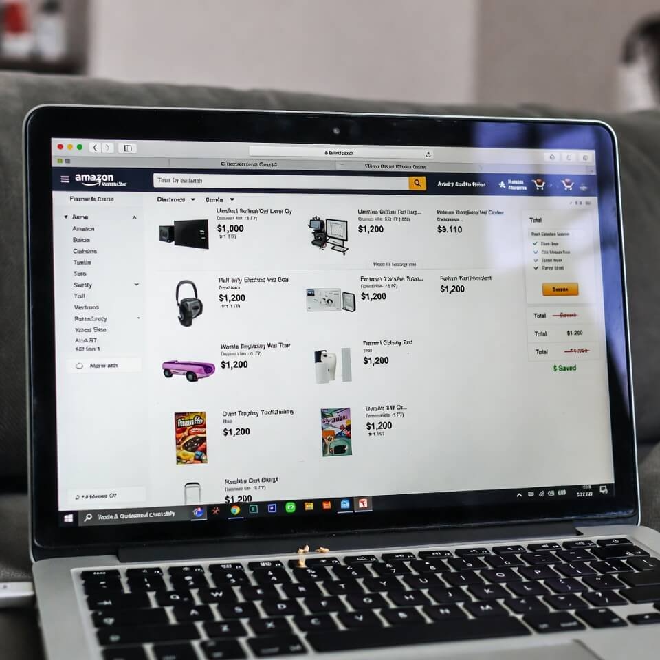 Laptop Amazon cart showing $1,200 total with chip crumbs